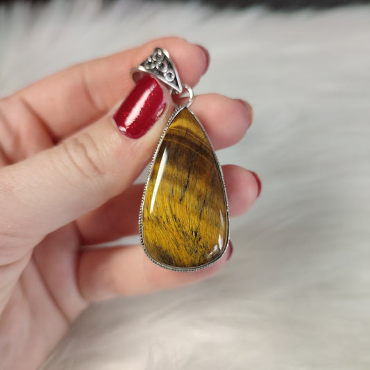 Colgante baño de plata con ojo de tigre