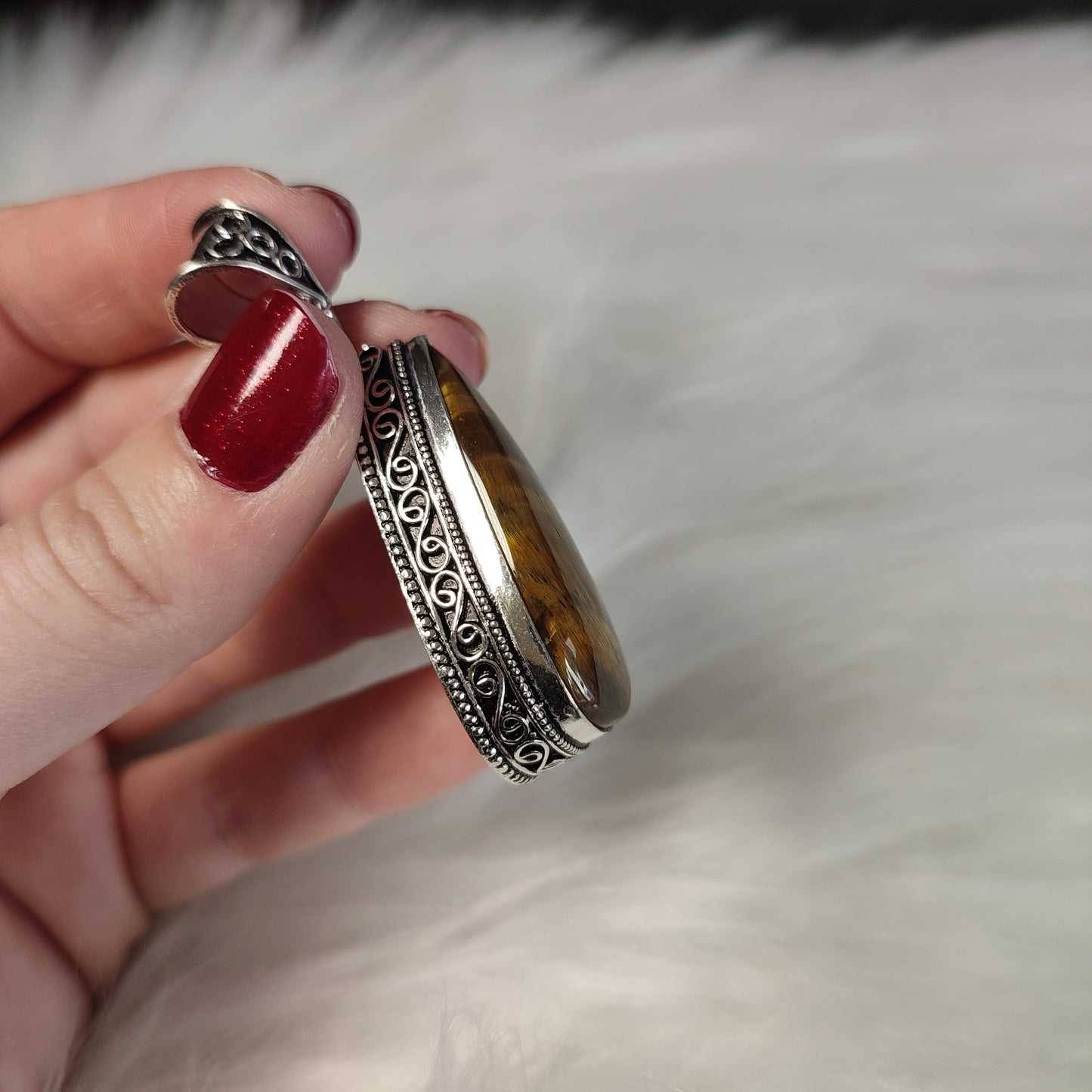 Colgante baño de plata con ojo de tigre