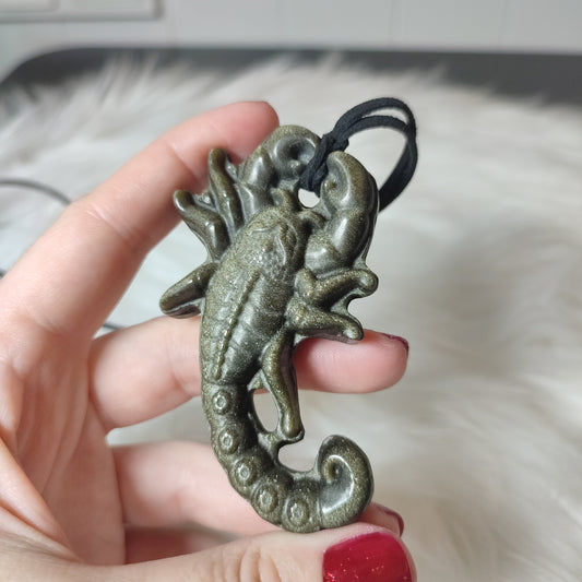 Escorpion obsidiana dorada