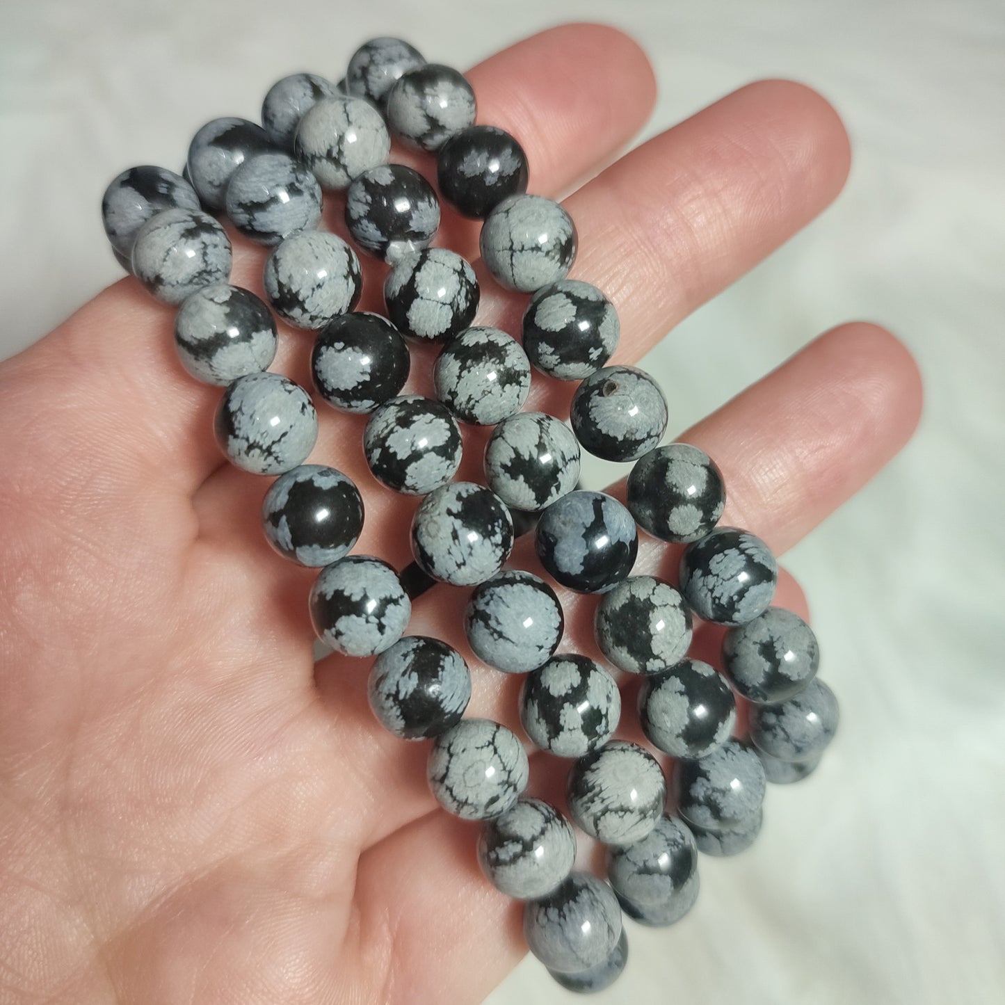 Pulsera elástica esferas de Obsidiana nevada 9 mm