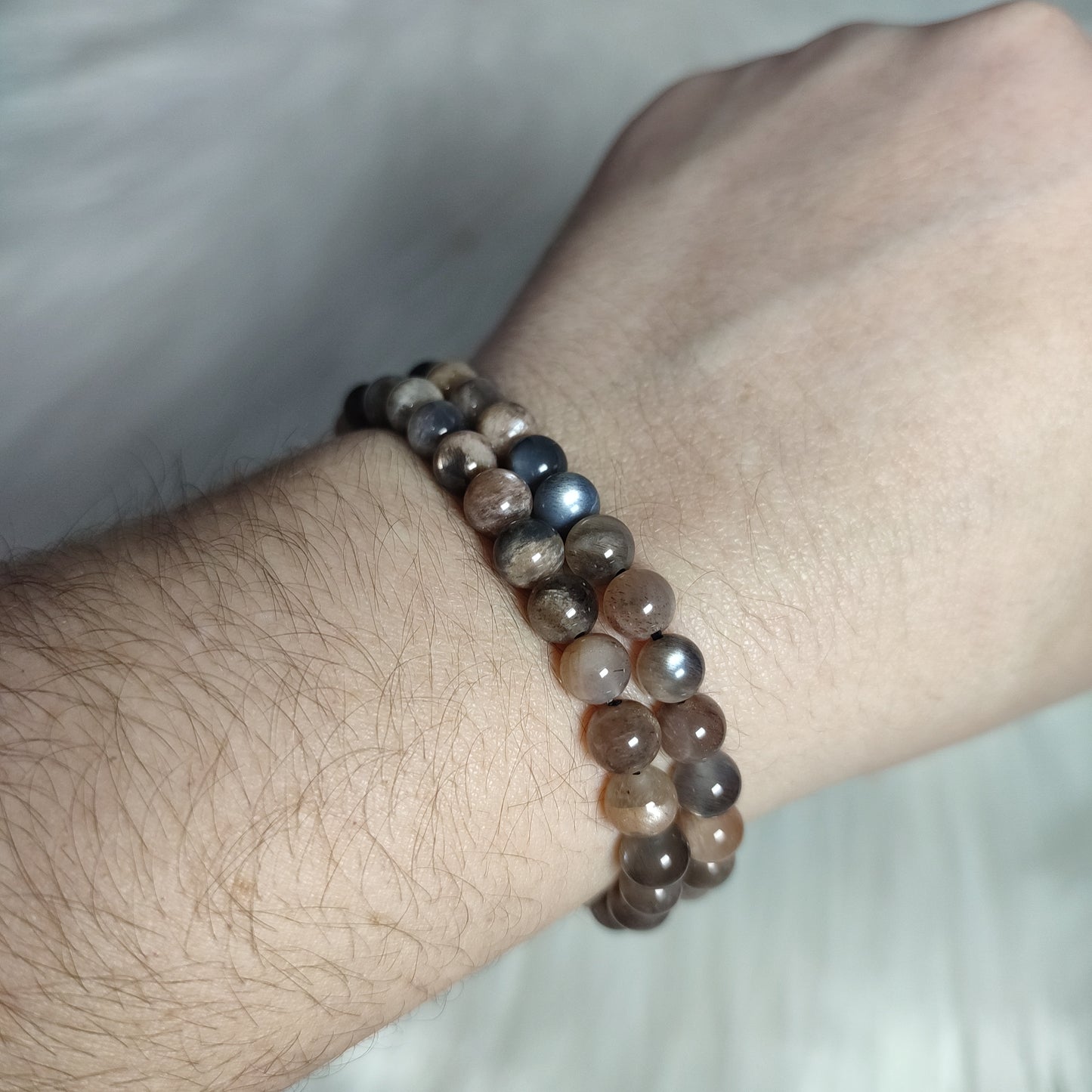 Pulsera elástica esferas de piedra luna mix melocotón/gris
