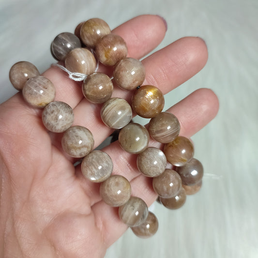 Pulsera elástica esferas de piedra luna mix melocotón/sol 12 mm