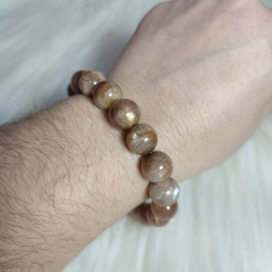 Pulsera elástica esferas de piedra luna mix melocotón/sol 12 mm