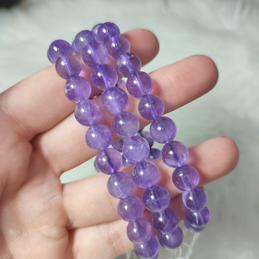Pulsera elástica esferas de amatista inclusiones 9 mm