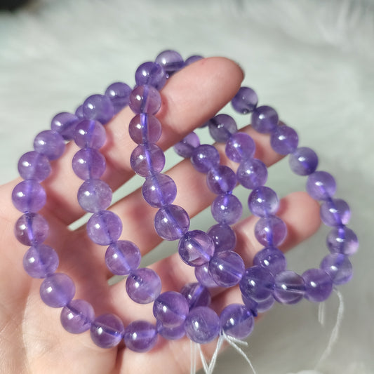 Pulsera elástica esferas de amatista inclusiones 9 mm
