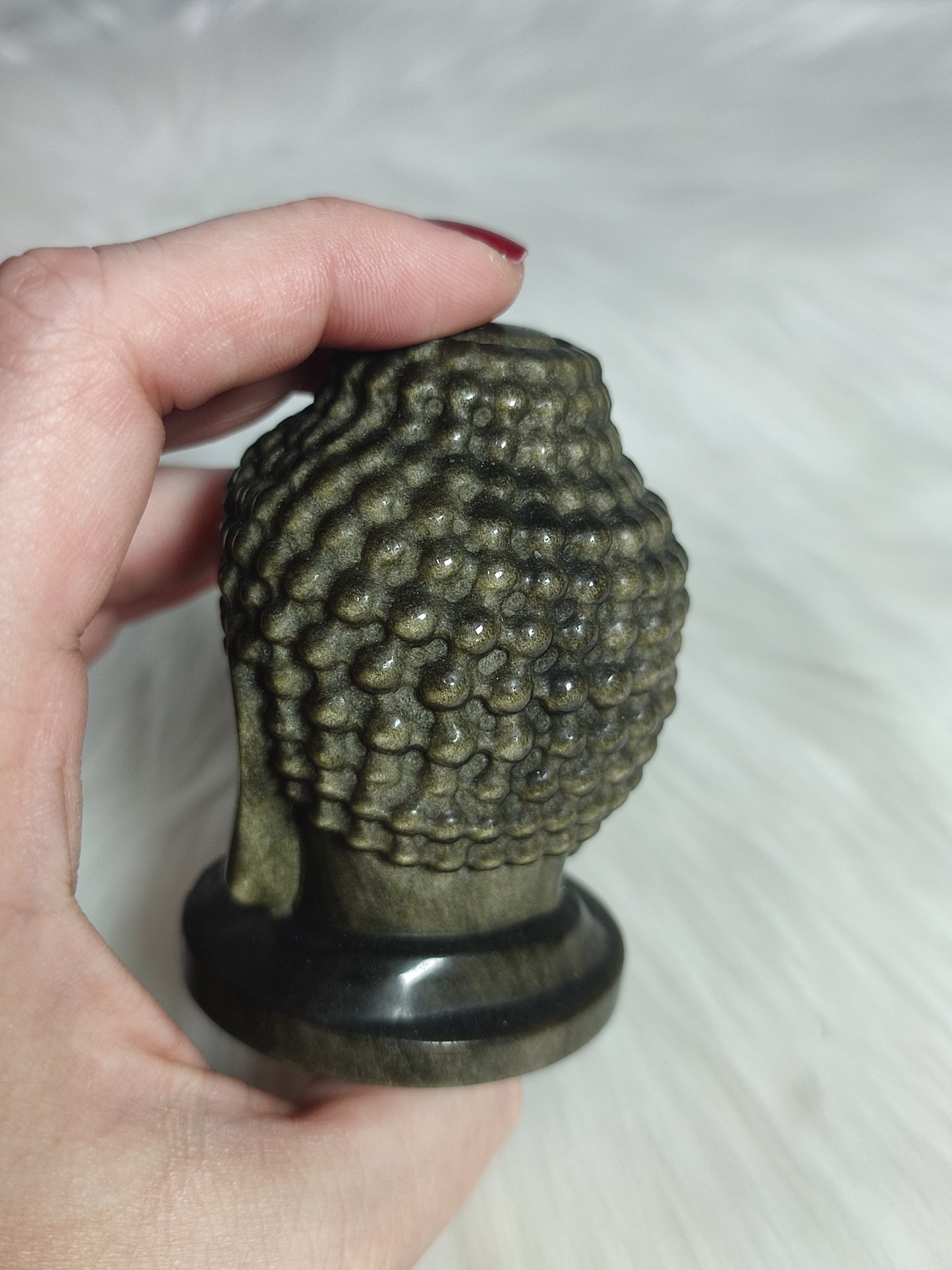 Cabeza buda tallado en Obsidiana dorada