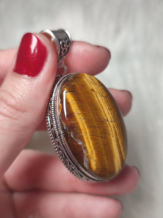 Colgante baño de plata con ojo de tigre 313