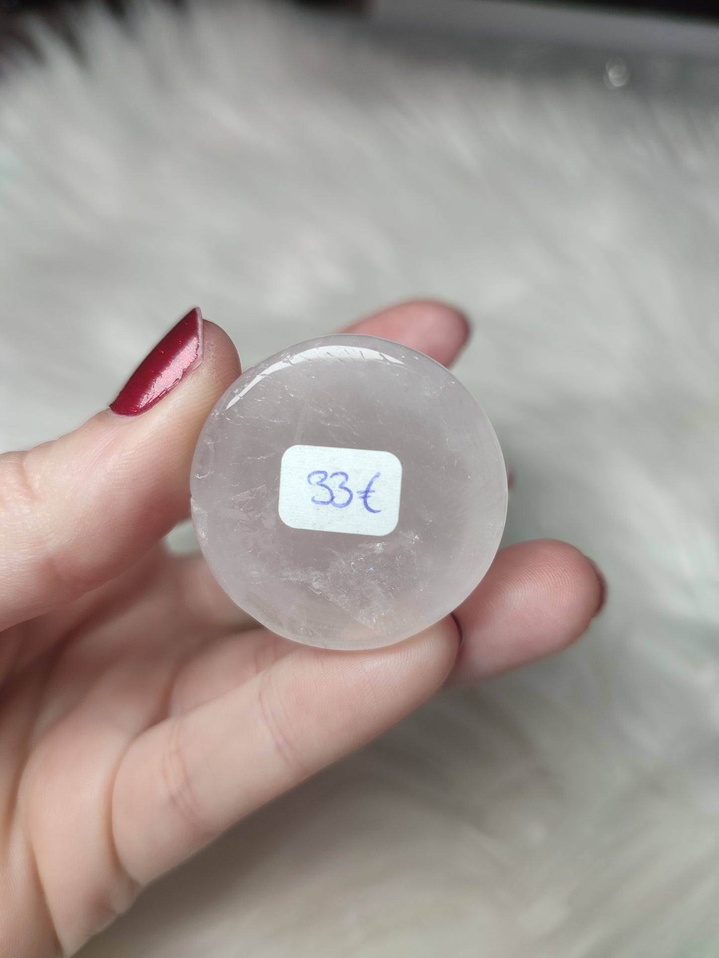 Talla de Ganesha en cuarzo rosa con base plana