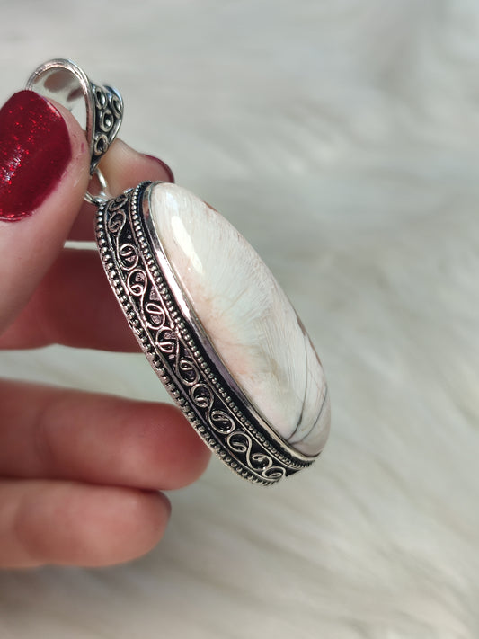 Colgante baño de plata con escolecita con estilbita