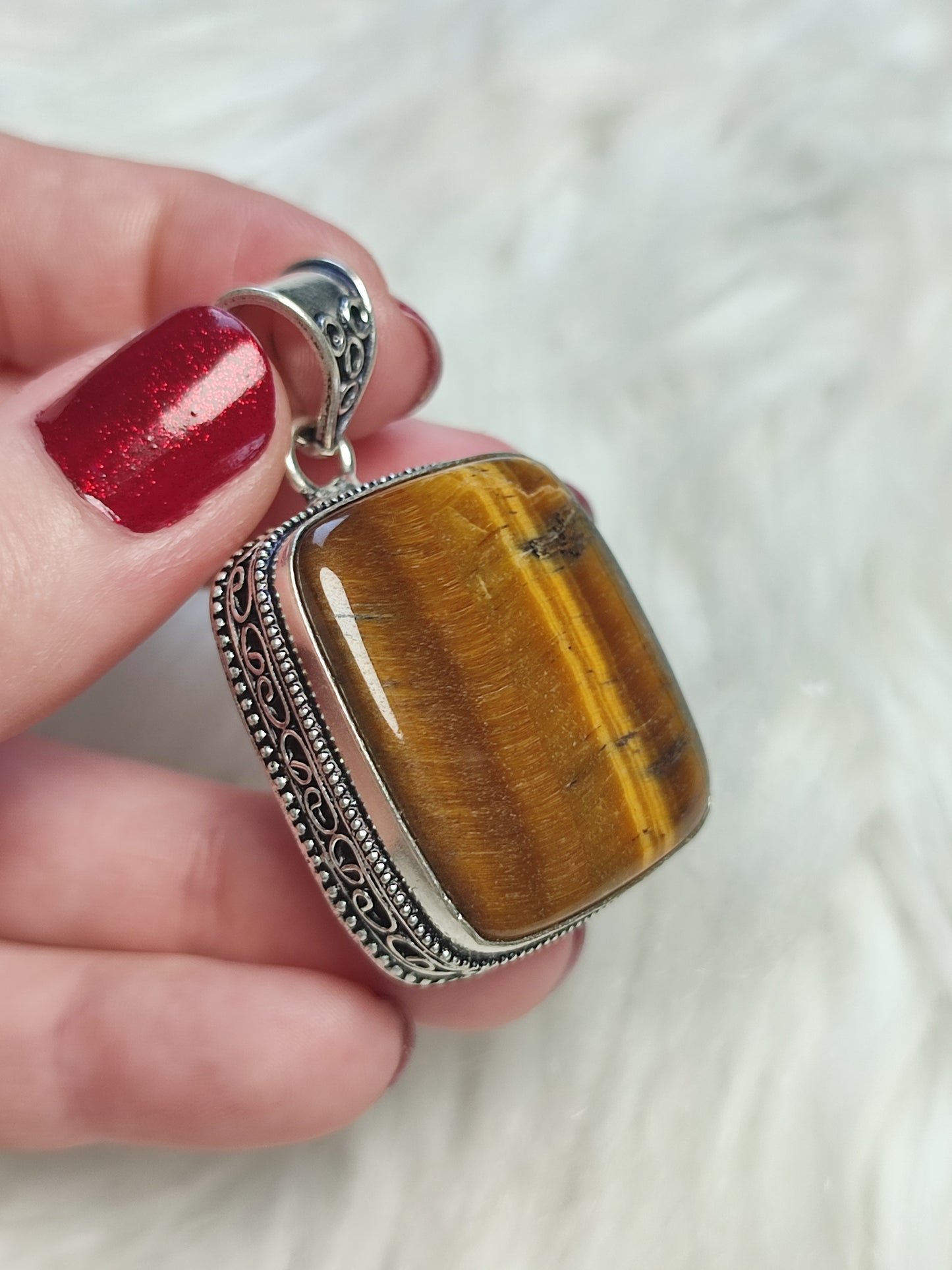 Colgante baño de plata con ojo de tigre 108