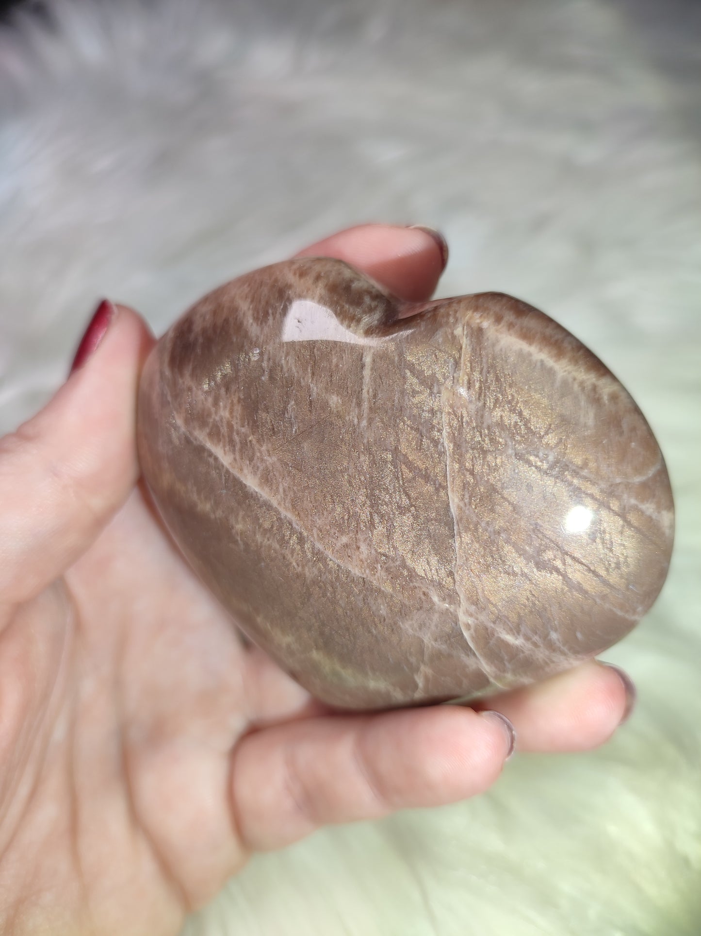 Corazón piedra luna melocotón con piedra sol 201 gramos