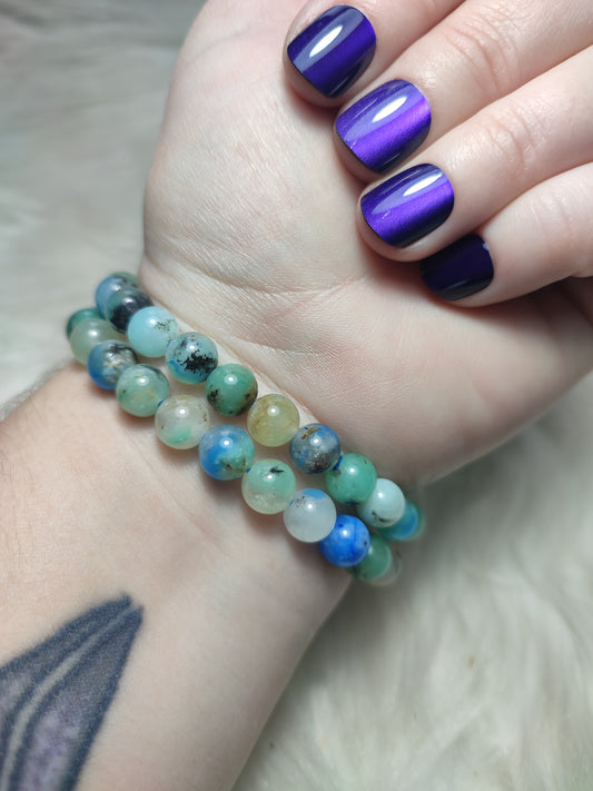 Pulsera elástica esferas piedra fénix 8 mm