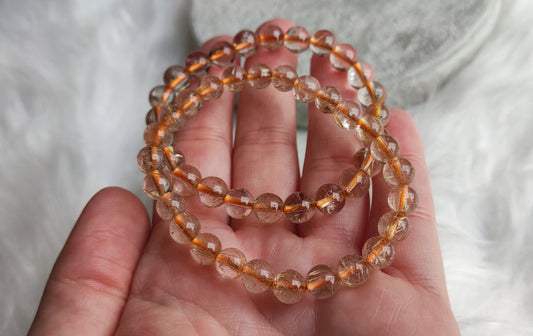 Pulsera elástica esferas cuarzo rutilo - cabello de ángel 7 mm