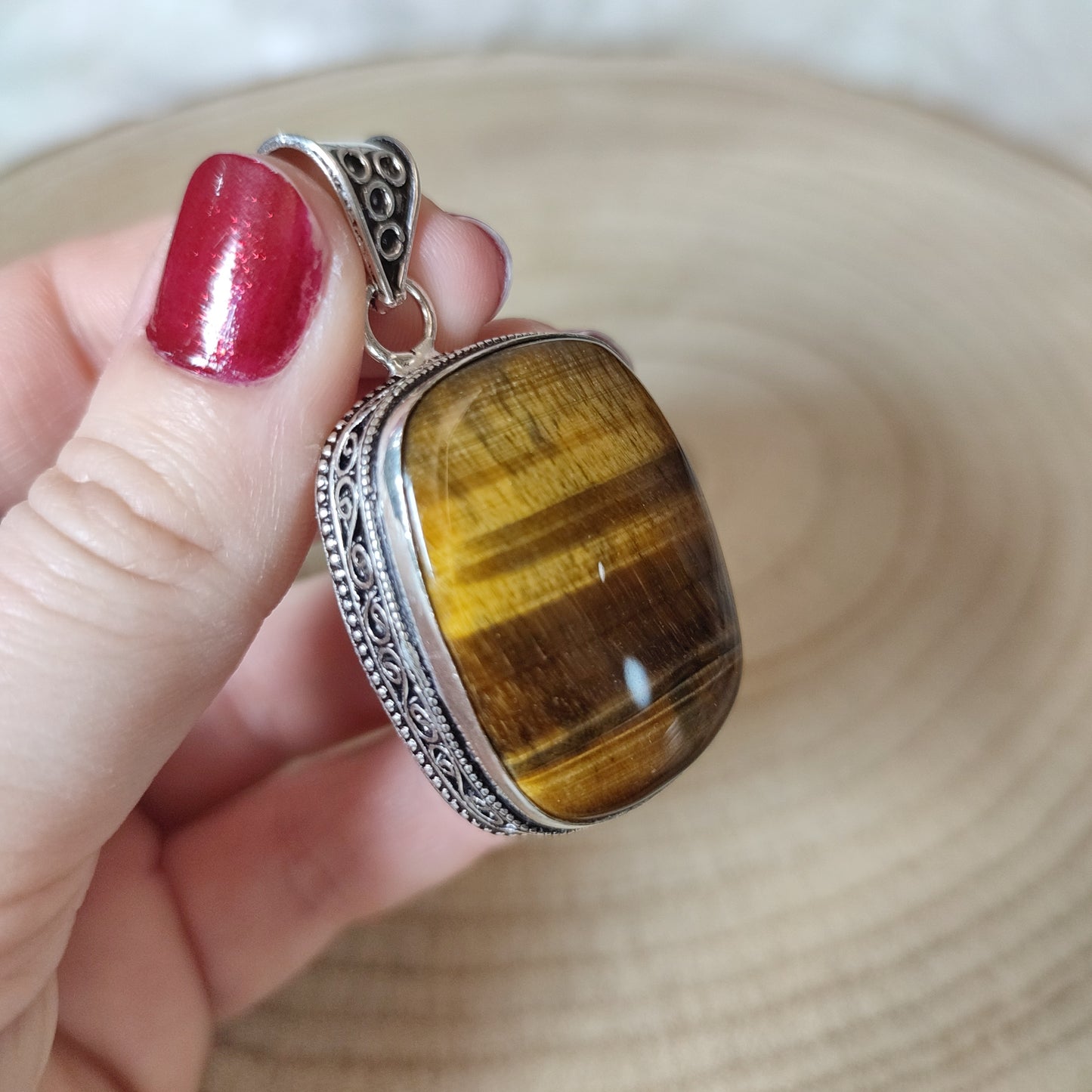 Colgante baño de plata con ojo de tigre