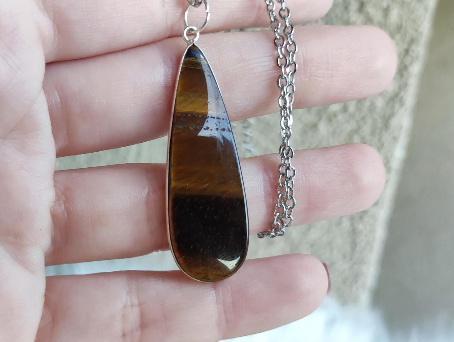 Collar baño de plata con ojo de tigre