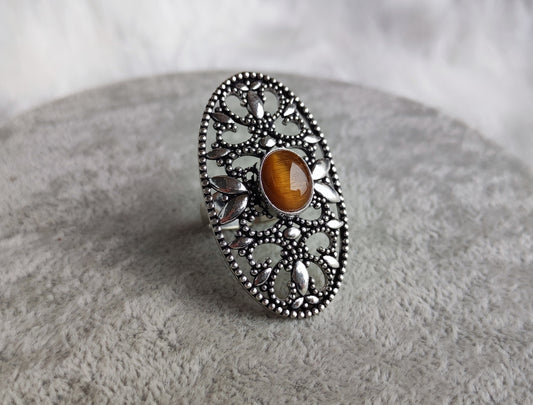 Anillo baño de plata con ojo de tigre