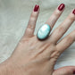 Anillo baño de plata con larimar