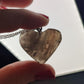 Colgante corazon en acero con cuarzo jardin chamanico n° 254