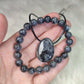 Conjunto colgante y pulsera larvikita