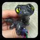 Lagarto Tom en larvikita