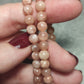 Pulsera elástica bolas 6 mm - Piedra Luna melocotón mix sol