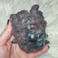Cabeza medusa gorgona tallada en astrofilita con granate 1040 gr - Video