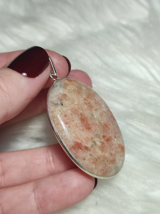 Colgante baño plata con piedra sol n°5