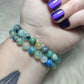 Pulsera elástica esferas piedra fénix 8 mm