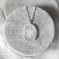 Collar  acero con selenita tallada - Cubo metatron