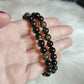 Pulsera elástica esferas de Obsidiana dorada