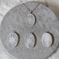 Collar  acero con selenita tallada - Cubo metatron